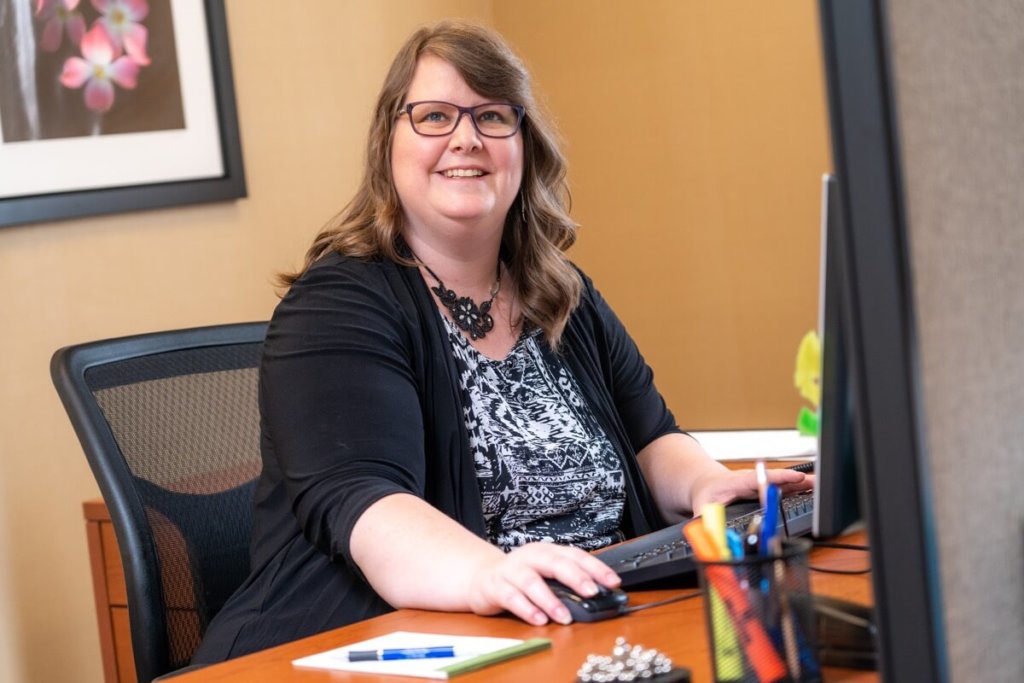 michelle sweigart at her desk