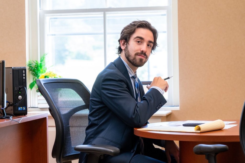 adam sclafani at his desk